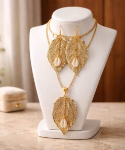 Gold Leaves and Cowrie Shells